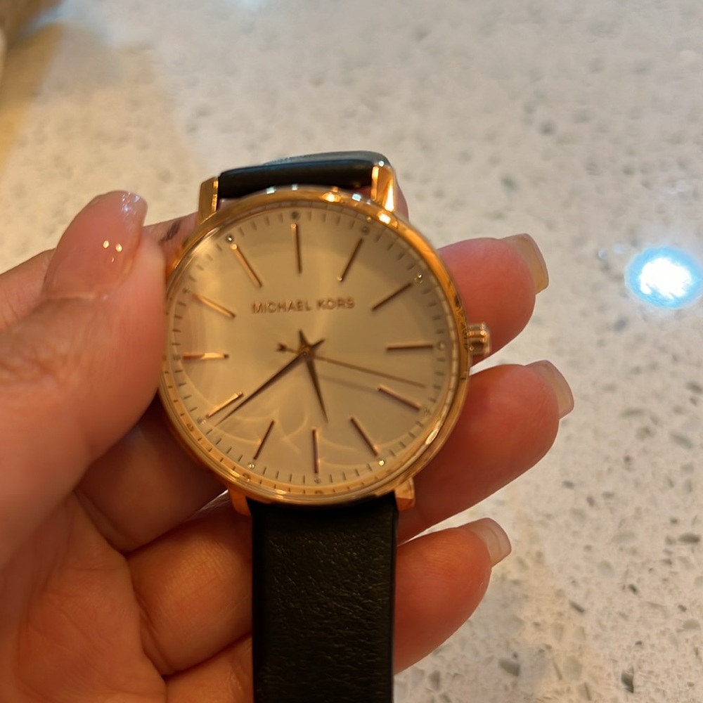 MK rose gold watch